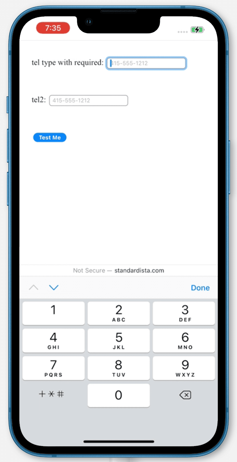 Keyboard iPhone yang menampilkan input type=tel.